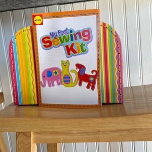 Alex brand My First Sewing Kit. New. Packaging ripped but brand new never used.